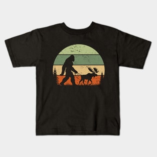 Vintage Bigfoot Walking a Moose Retro Sunset Outdoor Kids T-Shirt